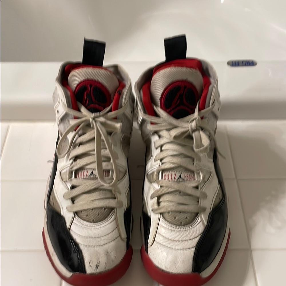 White and Red High-Top Sneakers with Black Accents